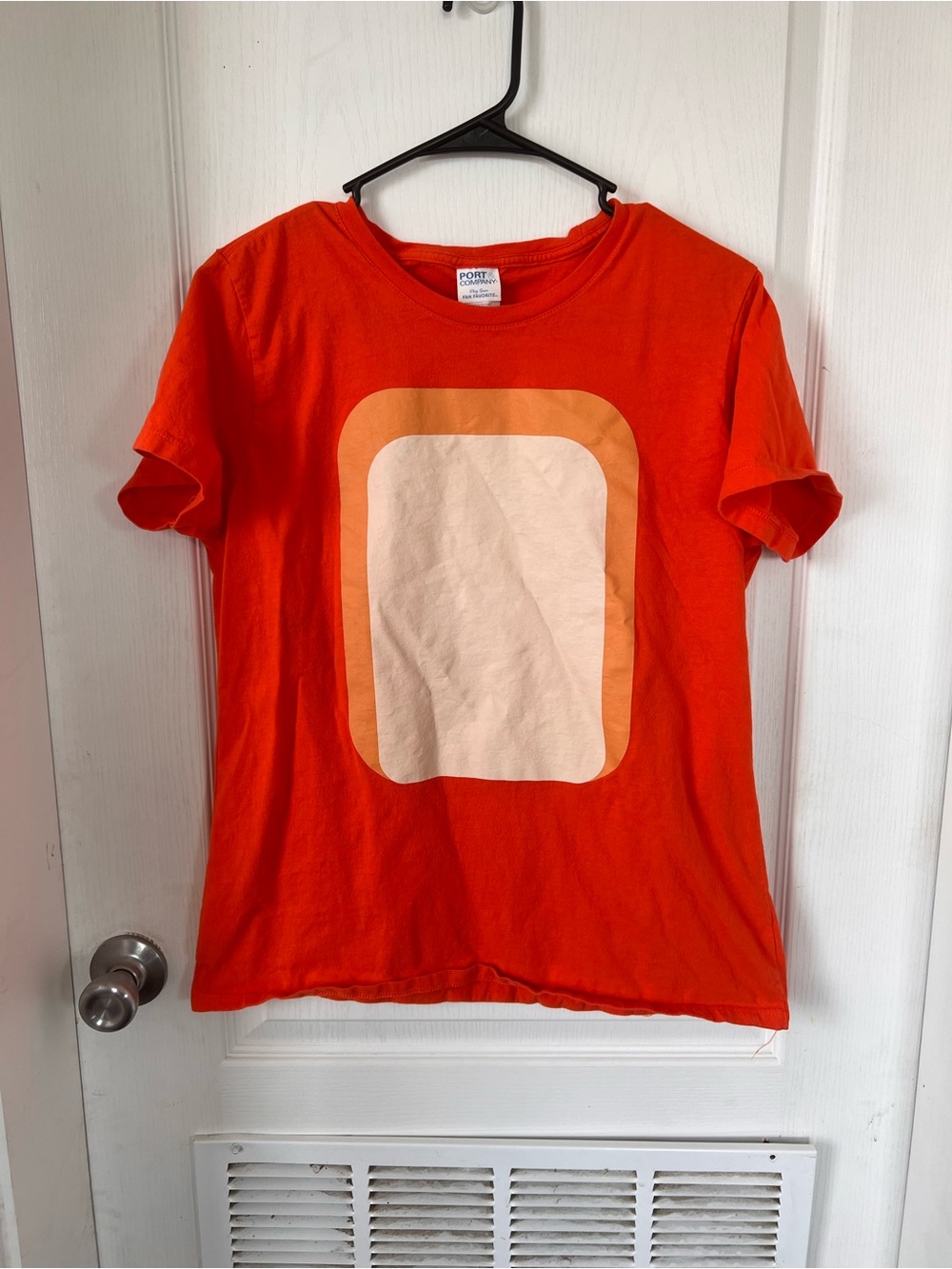 Bright Orange Graphic Tee with Retro Square Print